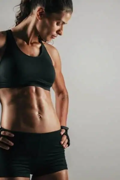 Toning Up at Home: The Ultimate Guide to Bodyweight Exercises 2 Image of woman's toned stomach after bodyweight exercises Brentford and non-surgical treatment from Lipo 360