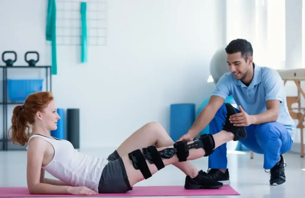 Debunking Meal Timing Myths: The Truth About Muscle Recovery 1 Woman having treatment to help muscle recovery Brentford after an injury