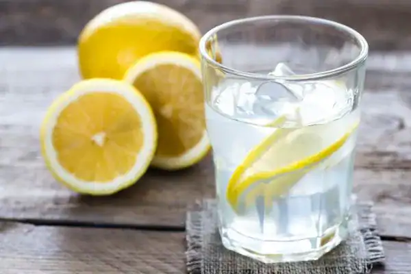 Hydration: The Secret Ingredient for a Toned Stomach and Enhanced Fitness 2 Image of lemon water to aid hydration Brentford